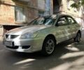 Сірий Міцубісі Lancer, об'ємом двигуна 1.58 л та пробігом 266 тис. км за 3800 $, фото 1 на Automoto.ua