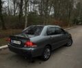 Сірий Міцубісі Lancer, об'ємом двигуна 1.6 л та пробігом 230 тис. км за 2799 $, фото 15 на Automoto.ua