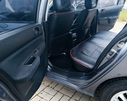 Серый Мицубиси Лансер, объемом двигателя 1.6 л и пробегом 100 тыс. км за 3500 $, фото 7 на Automoto.ua