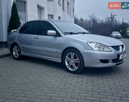 Серый Мицубиси Лансер, объемом двигателя 2 л и пробегом 188 тыс. км за 4200 $, фото 1 на Automoto.ua