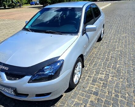 Сірий Міцубісі Lancer, об'ємом двигуна 2 л та пробігом 278 тис. км за 4000 $, фото 5 на Automoto.ua