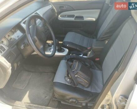Сірий Міцубісі Lancer, об'ємом двигуна 1.6 л та пробігом 244 тис. км за 3300 $, фото 6 на Automoto.ua
