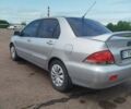Сірий Міцубісі Lancer, об'ємом двигуна 1.6 л та пробігом 250 тис. км за 4000 $, фото 5 на Automoto.ua