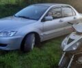 Сірий Міцубісі Lancer, об'ємом двигуна 1.58 л та пробігом 250 тис. км за 5000 $, фото 3 на Automoto.ua