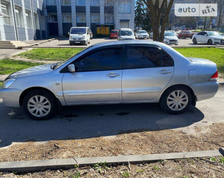 Сірий Міцубісі Lancer, об'ємом двигуна 1.6 л та пробігом 228 тис. км за 3999 $, фото 3 на Automoto.ua