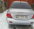 Сірий Міцубісі Lancer, об'ємом двигуна 1.6 л та пробігом 261 тис. км за 6800 $, фото 1 на Automoto.ua