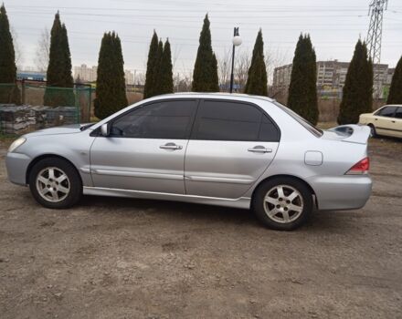 Сірий Міцубісі Lancer, об'ємом двигуна 0.16 л та пробігом 291 тис. км за 3900 $, фото 7 на Automoto.ua