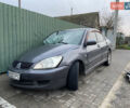 Сірий Міцубісі Lancer, об'ємом двигуна 1.58 л та пробігом 230 тис. км за 1400 $, фото 15 на Automoto.ua