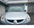 Сірий Міцубісі Lancer, об'ємом двигуна 1.6 л та пробігом 228 тис. км за 2854 $, фото 1 на Automoto.ua