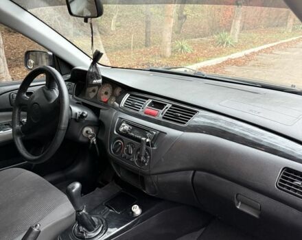 Сірий Міцубісі Lancer, об'ємом двигуна 1.6 л та пробігом 230 тис. км за 2799 $, фото 21 на Automoto.ua