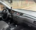Сірий Міцубісі Lancer, об'ємом двигуна 1.6 л та пробігом 230 тис. км за 2799 $, фото 21 на Automoto.ua