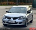 Серый Мицубиси Лансер, объемом двигателя 1.6 л и пробегом 230 тыс. км за 3750 $, фото 1 на Automoto.ua