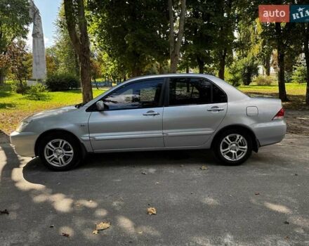 Серый Мицубиси Лансер, объемом двигателя 1.6 л и пробегом 196 тыс. км за 4490 $, фото 11 на Automoto.ua