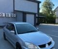 Серый Мицубиси Лансер, объемом двигателя 1.58 л и пробегом 284 тыс. км за 4550 $, фото 1 на Automoto.ua