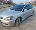 Серый Мицубиси Лансер, объемом двигателя 2 л и пробегом 249 тыс. км за 3800 $, фото 4 на Automoto.ua