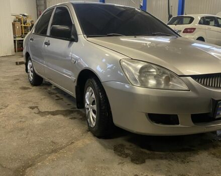 Сірий Міцубісі Lancer, об'ємом двигуна 1.3 л та пробігом 304 тис. км за 3950 $, фото 1 на Automoto.ua