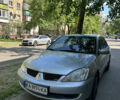 Сірий Міцубісі Lancer, об'ємом двигуна 1.58 л та пробігом 290 тис. км за 3500 $, фото 1 на Automoto.ua