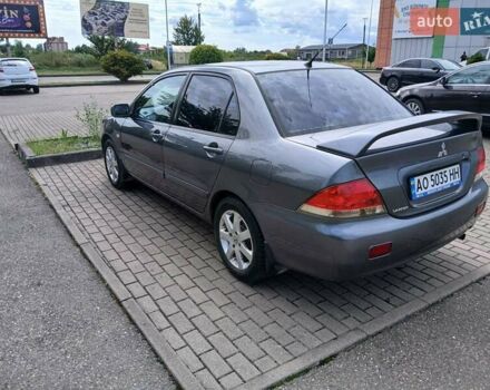 Сірий Міцубісі Lancer, об'ємом двигуна 1.58 л та пробігом 200 тис. км за 4000 $, фото 8 на Automoto.ua