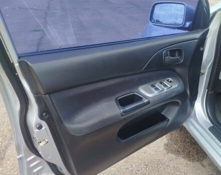 Серый Мицубиси Лансер, объемом двигателя 1.6 л и пробегом 250 тыс. км за 3600 $, фото 20 на Automoto.ua