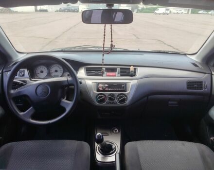 Серый Мицубиси Лансер, объемом двигателя 1.6 л и пробегом 250 тыс. км за 3600 $, фото 22 на Automoto.ua