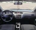 Серый Мицубиси Лансер, объемом двигателя 1.6 л и пробегом 250 тыс. км за 3600 $, фото 22 на Automoto.ua