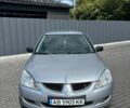 Сірий Міцубісі Lancer, об'ємом двигуна 1.58 л та пробігом 300 тис. км за 3550 $, фото 1 на Automoto.ua