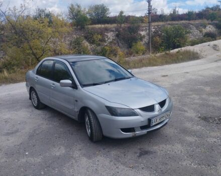 Сірий Міцубісі Lancer, об'ємом двигуна 1.6 л та пробігом 244 тис. км за 3300 $, фото 2 на Automoto.ua