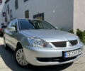 Сірий Міцубісі Lancer, об'ємом двигуна 1.6 л та пробігом 99 тис. км за 3999 $, фото 1 на Automoto.ua