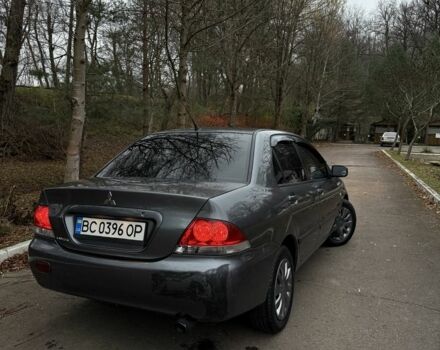 Сірий Міцубісі Lancer, об'ємом двигуна 1.6 л та пробігом 230 тис. км за 2799 $, фото 16 на Automoto.ua