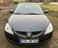 Сірий Міцубісі Lancer, об'ємом двигуна 1.8 л та пробігом 150 тис. км за 1700 $, фото 1 на Automoto.ua