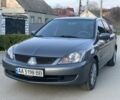 Сірий Міцубісі Lancer, об'ємом двигуна 1.6 л та пробігом 273 тис. км за 3850 $, фото 1 на Automoto.ua