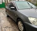 Сірий Міцубісі Lancer, об'ємом двигуна 1.6 л та пробігом 285 тис. км за 4000 $, фото 1 на Automoto.ua
