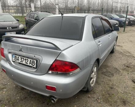 Серый Мицубиси Лансер, объемом двигателя 1.6 л и пробегом 200 тыс. км за 3906 $, фото 4 на Automoto.ua
