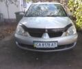 Сірий Міцубісі Lancer, об'ємом двигуна 1.58 л та пробігом 227 тис. км за 5400 $, фото 1 на Automoto.ua