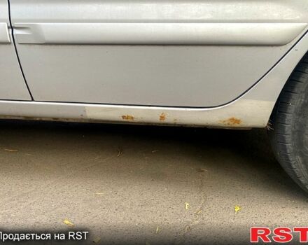 Сірий Міцубісі Lancer, об'ємом двигуна 1.6 л та пробігом 230 тис. км за 3200 $, фото 10 на Automoto.ua