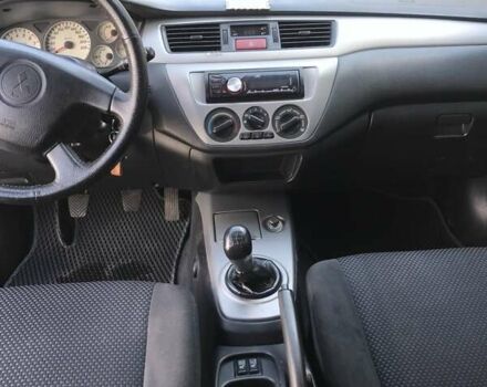 Сірий Міцубісі Lancer, об'ємом двигуна 1.58 л та пробігом 274 тис. км за 4400 $, фото 12 на Automoto.ua