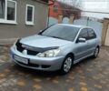 Сірий Міцубісі Lancer, об'ємом двигуна 1.6 л та пробігом 199 тис. км за 4950 $, фото 2 на Automoto.ua