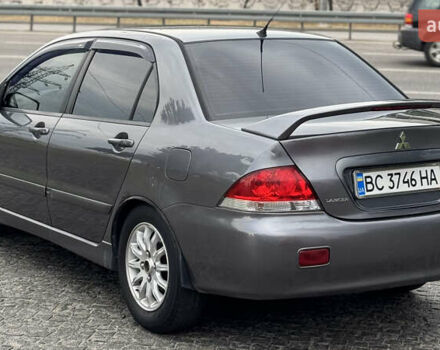 Сірий Міцубісі Lancer, об'ємом двигуна 1.58 л та пробігом 223 тис. км за 3599 $, фото 1 на Automoto.ua
