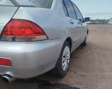 Серый Мицубиси Лансер, объемом двигателя 1.6 л и пробегом 250 тыс. км за 3600 $, фото 16 на Automoto.ua