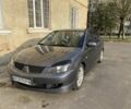 Сірий Міцубісі Lancer, об'ємом двигуна 2 л та пробігом 233 тис. км за 2900 $, фото 1 на Automoto.ua