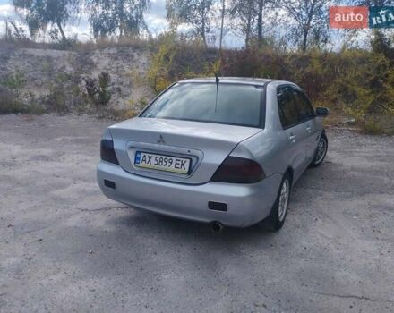 Сірий Міцубісі Lancer, об'ємом двигуна 1.6 л та пробігом 244 тис. км за 3300 $, фото 3 на Automoto.ua