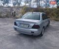 Сірий Міцубісі Lancer, об'ємом двигуна 1.6 л та пробігом 244 тис. км за 3300 $, фото 3 на Automoto.ua