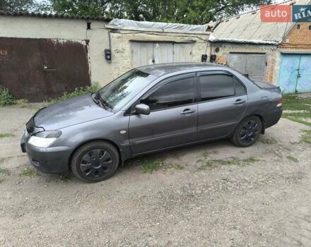 Сірий Міцубісі Lancer, об'ємом двигуна 1.6 л та пробігом 257 тис. км за 3700 $, фото 1 на Automoto.ua