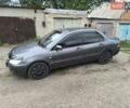 Сірий Міцубісі Lancer, об'ємом двигуна 1.6 л та пробігом 257 тис. км за 3700 $, фото 1 на Automoto.ua