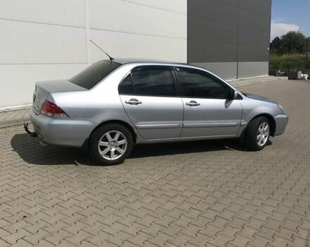 Сірий Міцубісі Lancer, об'ємом двигуна 1.58 л та пробігом 274 тис. км за 4400 $, фото 2 на Automoto.ua