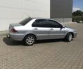 Сірий Міцубісі Lancer, об'ємом двигуна 1.58 л та пробігом 274 тис. км за 4400 $, фото 2 на Automoto.ua