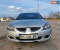 Серый Мицубиси Лансер, объемом двигателя 2 л и пробегом 249 тыс. км за 3800 $, фото 1 на Automoto.ua