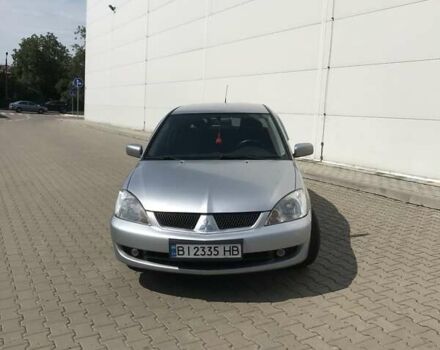 Сірий Міцубісі Lancer, об'ємом двигуна 1.58 л та пробігом 274 тис. км за 4400 $, фото 1 на Automoto.ua