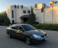 Сірий Міцубісі Lancer, об'ємом двигуна 1.58 л та пробігом 263 тис. км за 4099 $, фото 1 на Automoto.ua