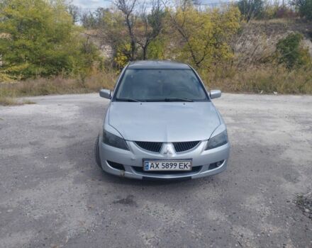 Сірий Міцубісі Lancer, об'ємом двигуна 1.6 л та пробігом 244 тис. км за 3300 $, фото 1 на Automoto.ua
